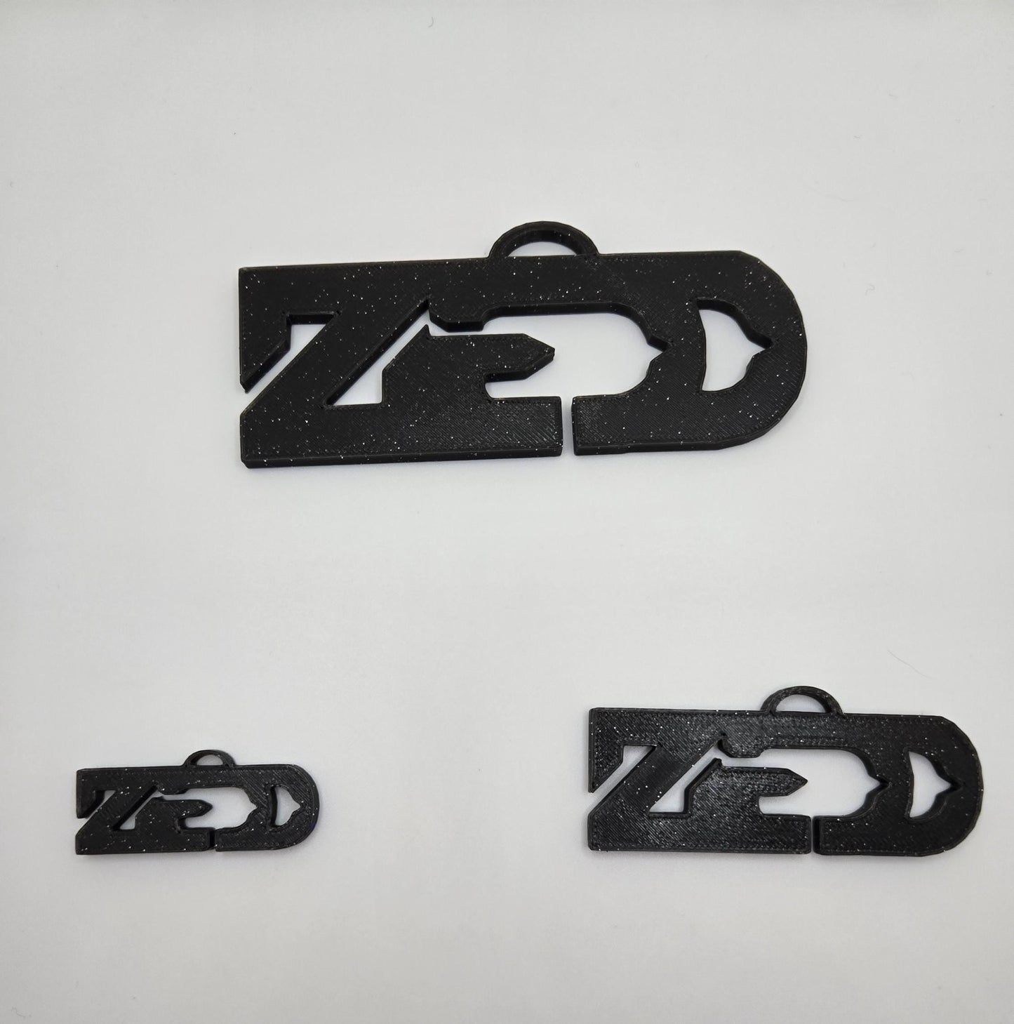 EDM Artist Glow Keychain / Necklace Charm | UV Reactive Glow Rave Accessory Pupifer's Kink Wonderland